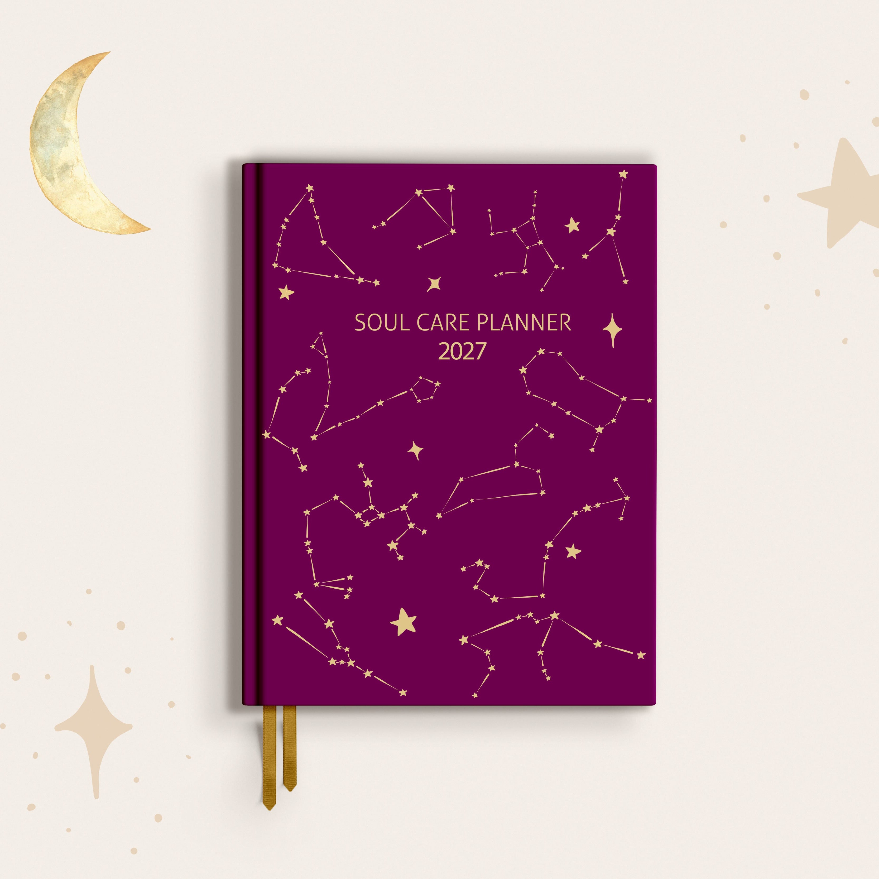 Purple planner with star constellations and 'Soul Care Planner 2027' text on a dark eggplant background
